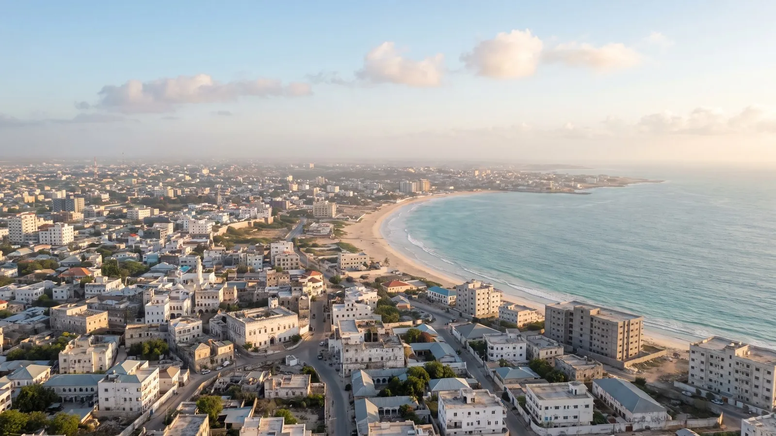 Illustration: Mogadishu from the air, the city running down to the beach